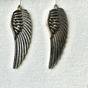 Silver tone angel wing earrings